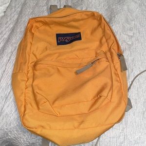 Jansport Tangerine Backpack. Used once! Beautiful and unique color!